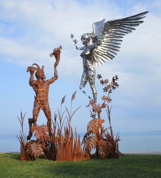 Garden sculpture Pan and Syrinx rusty